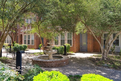 View of front facade featuring brick siding
