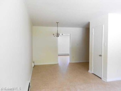 Dining Room. Original dining area, now connects to both living room and den.