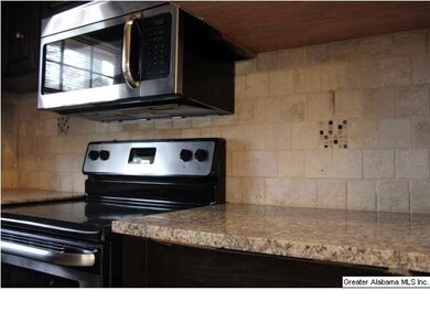 Nice ceramic tile back splash, with stainless stee