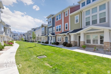 View of home's community featuring a residential view and a lawn