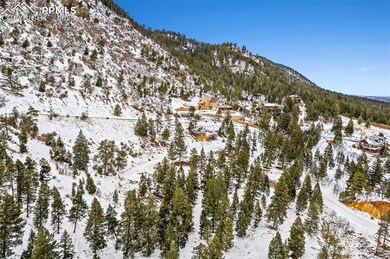 Snowy aerial view featuring a mountain view