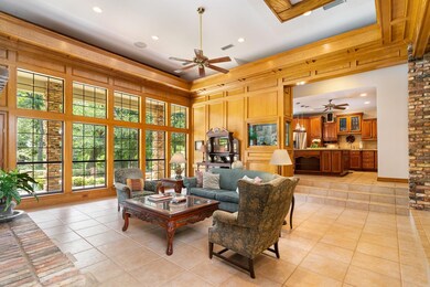 Living room looking out over the pool and porch.