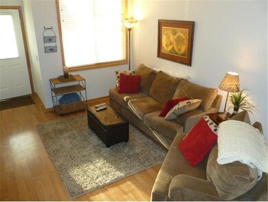 Main floor with big window and fireplace for relax