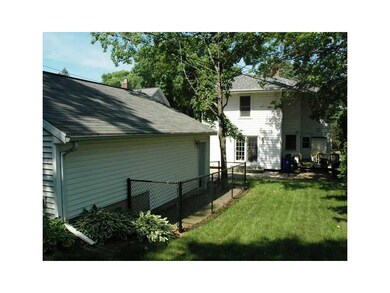 Yard. Rear yard, deck and block patio.  Two car ga