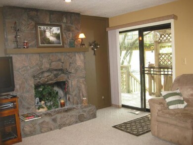Family room walks out to covered deck.