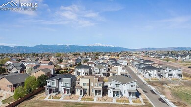 Aerial view of modern townhome featuring stunning 