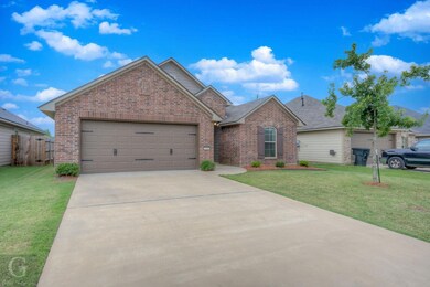 View of front of house featuring a front lawn and 