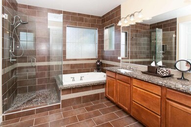 Master Bath with Floor to Ceiling Tile