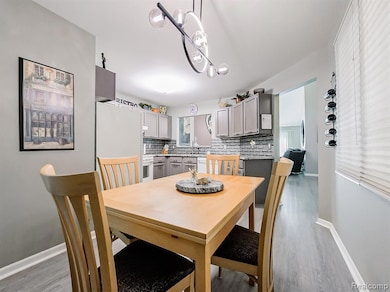 Dining room with light wood-style floors