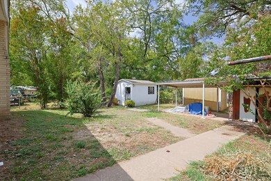 Spacious backyard with storage options