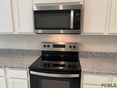 56 Oakleaf Way, Palm Coast, FL 32137 - photo 5