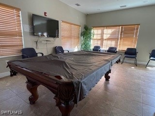 Rec room featuring light tile patterned floors and