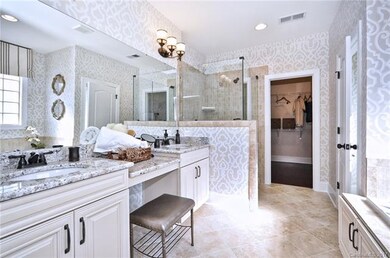 Note:  Photo represents the decorated Owner's Bath