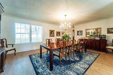 You won't believe the size of this formal dining area, located to the right as you walk in the front door. It's perfect for your next party. If you're more informal, this would also be a great place for a pool table.