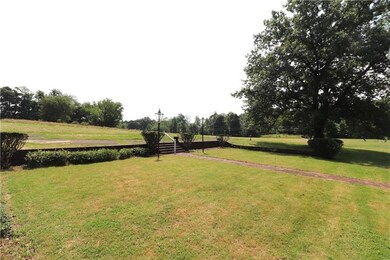 2nd View of the brick wall FRONT LAWN area & the E