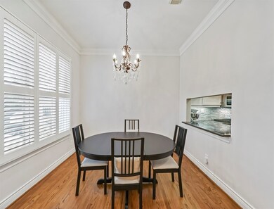 The formal dining room with high ceiling includes