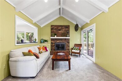 The Family Room boasts vaulted ceiling, fireplace 