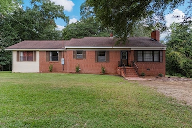 Front View of all brick, ranch-style house