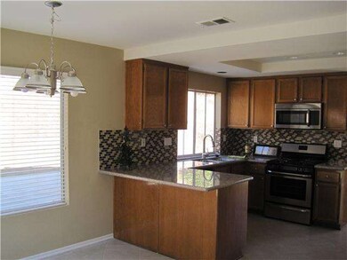 Kitchen with granite countertops and beautiful bac
