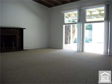 Living Room with Fireplace. High Ceilings