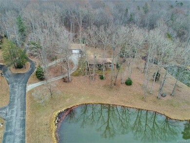 Lakefront log cabin sitting on 11 acres in Hunters