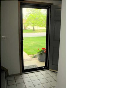 Foyer features Tile Flooring