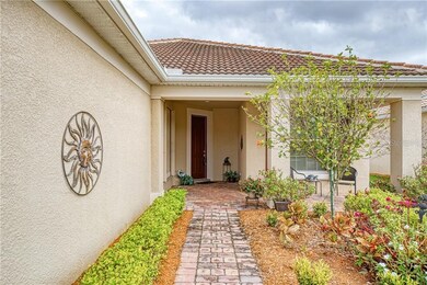paver sidewalk leading to front porch
