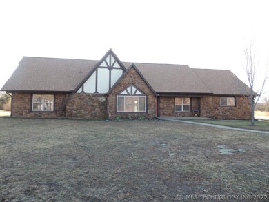 One story stone home surrounded a 10 acre partiall