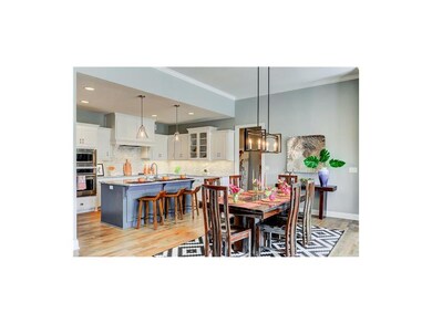 Spacious kitchen boasts generous amount of cabinet