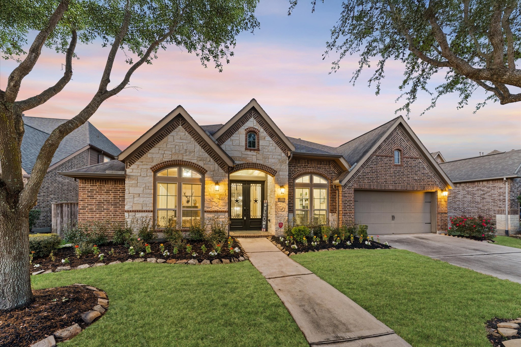 Charming curb appeal is enhanced by elegant exteri
