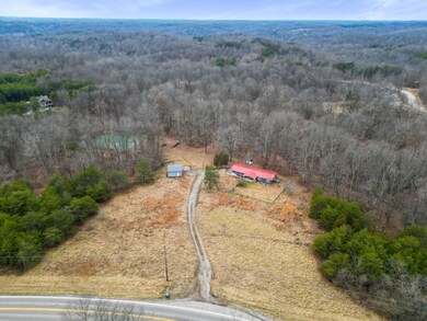 Birds eye view of 12.84 acres w pond