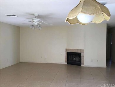 nice open living room with fire place.