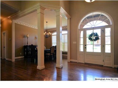 Dining room is open to entry way and great room