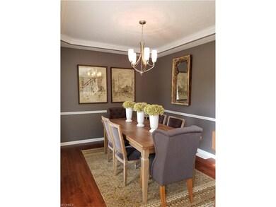 Formal Dining Room with wood flooring