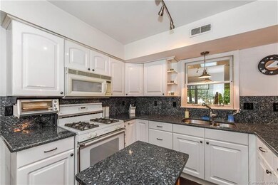 The kitchen has been update with granite counters 