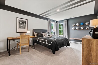 Bedroom with light carpet