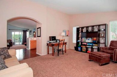 Enter on to wood laminate floor, newer carpet. Cus