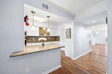 A front view of the kitchen overlooking the living