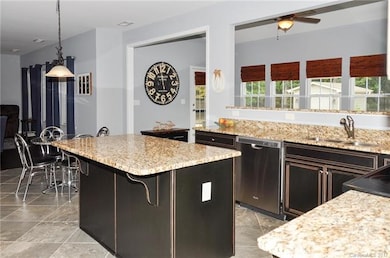 Designer touches include Custom Finished Cabinets 