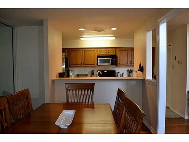 Photo. Dining room looking into kitchen