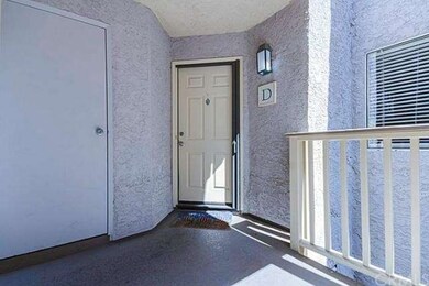 Entrance Door with Hidden Screen and Storage to Le