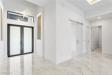 Walk through FRONT PORCH & enter DOUBLE FRONT DOOR