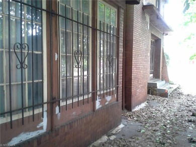 Side of home with oversized windows and beautiful 