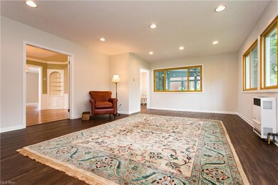 Large  Family Room  (22' x 16') is accessed throug