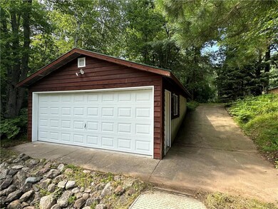 Boat house with electric and garage door opener.