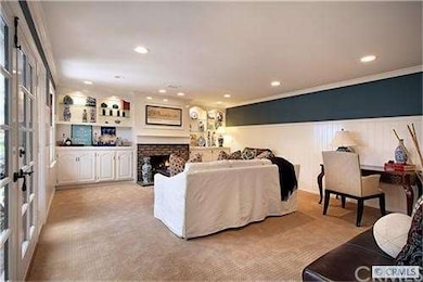 Entertainment room with bar area accesses the used