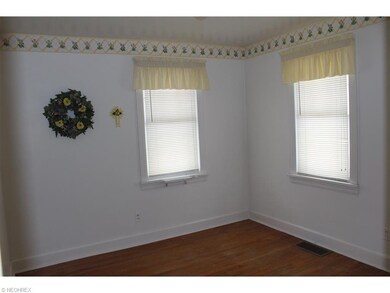 Bedroom 2 has wood floors.