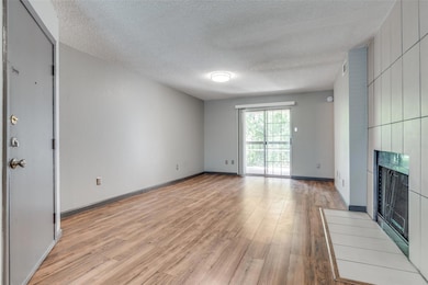 Living room featuring light wood like flooring, mo