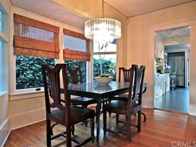 Sunny dining room with custom window treatments