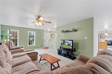 Nice and bright living room. Tons of light fill th